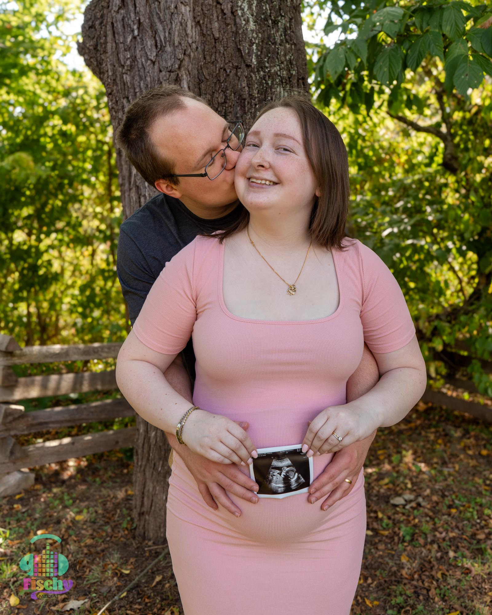 happy couple
young couple
pregnant woman in pink dress
maternity photoshoot
maternity photos
outdoor photography
outdoor maternity
couples' maternity photos
ultrasound maternity