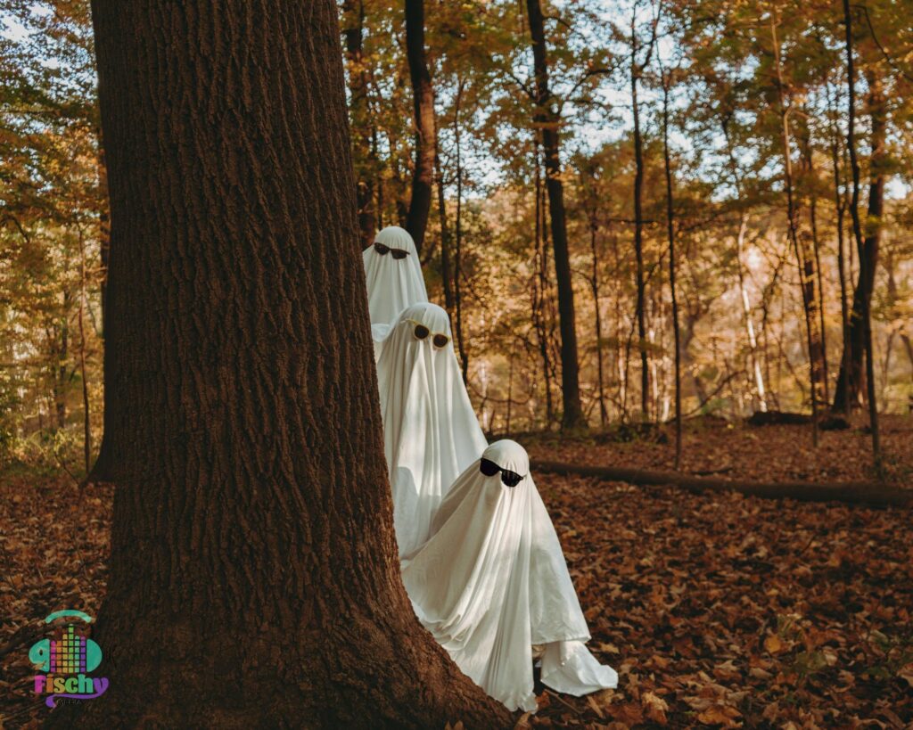 three ghosts behind a tree
ghosts wearing sunglasses