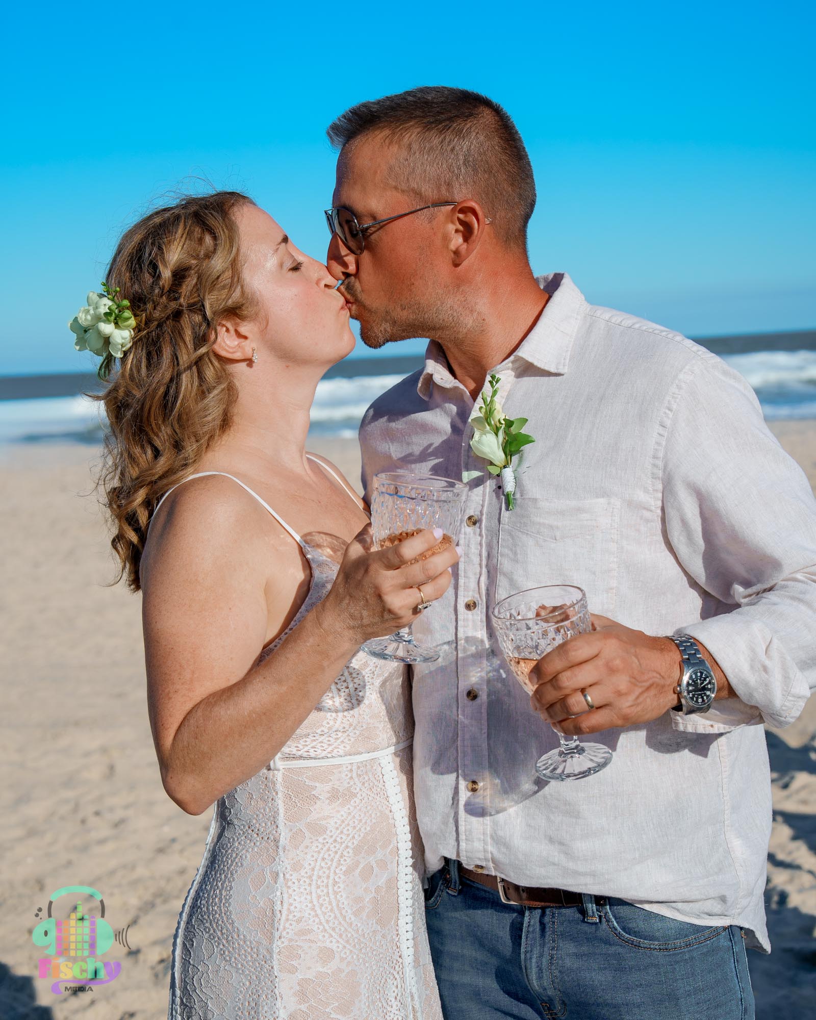 couple on beach
beach wedding photos
vow renewal ceremony
new jersey beach photos
golden hour
event photography