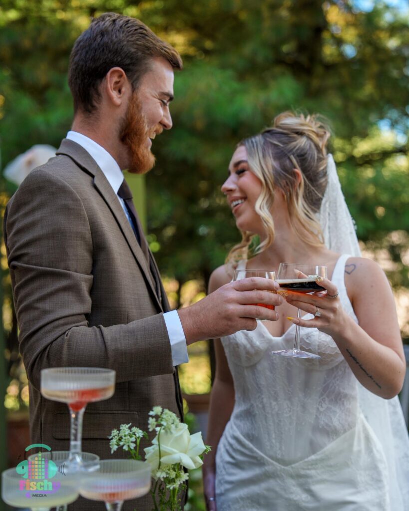 Bride and groom cheers
bride and groom laughing
wedding dress
Wedding photographer
Wedding photoshoot