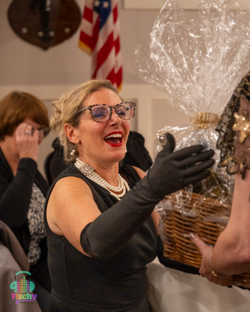 woman receiving auction basket
public event