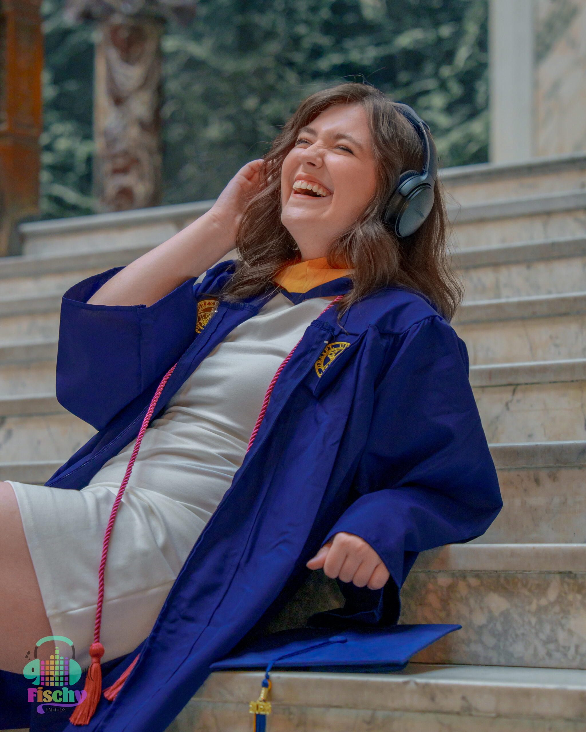 college graduate girl
graduate wearing cap and gown
drexel
graduation photoshoot
grad pics