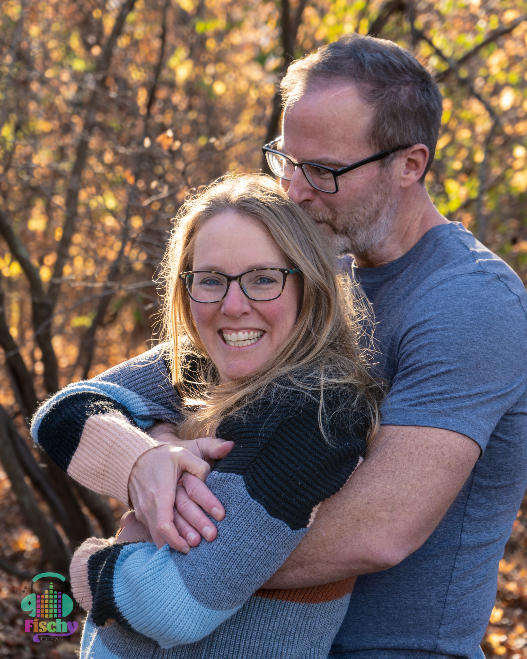 middle aged couple
hugging and kissing